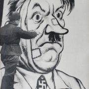 С.Б. Телингатер рисует карикатурный портрет Гитлера. 1942. Предоставлено: Музей-заповедник "Горки Ленинские".