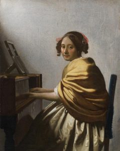 Ян Вермеер "Молодая женщина сидящая за вёрджинелом" Около 1670-1672